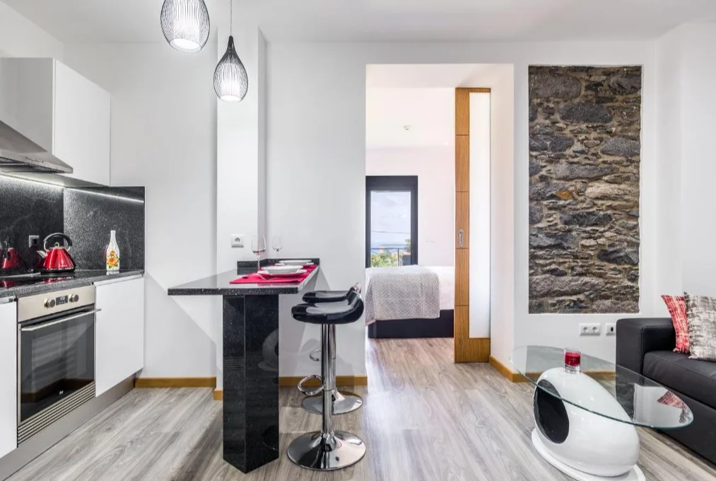 Enxurros House | keuken en zithoek